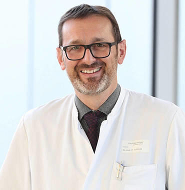 Dr. Erik Schlicht